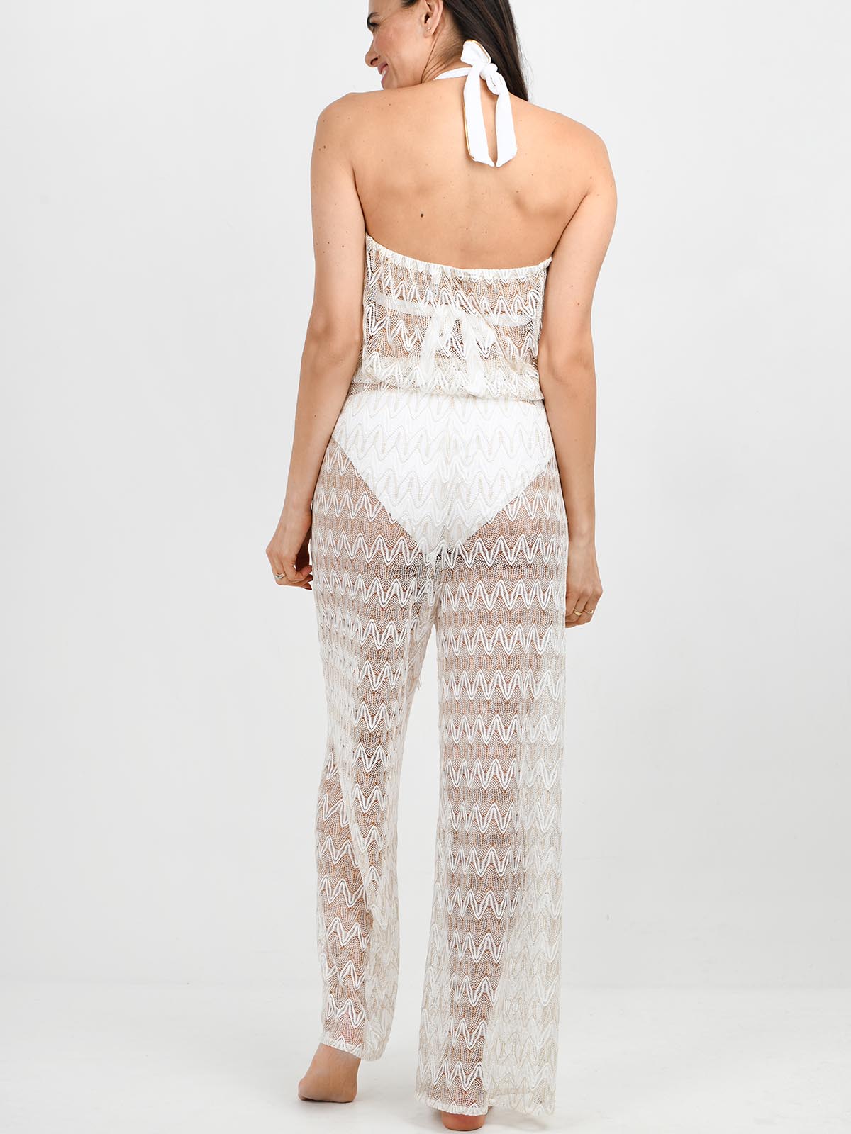 Model wearing the Ibiza jumpsuit by NAIA Beach