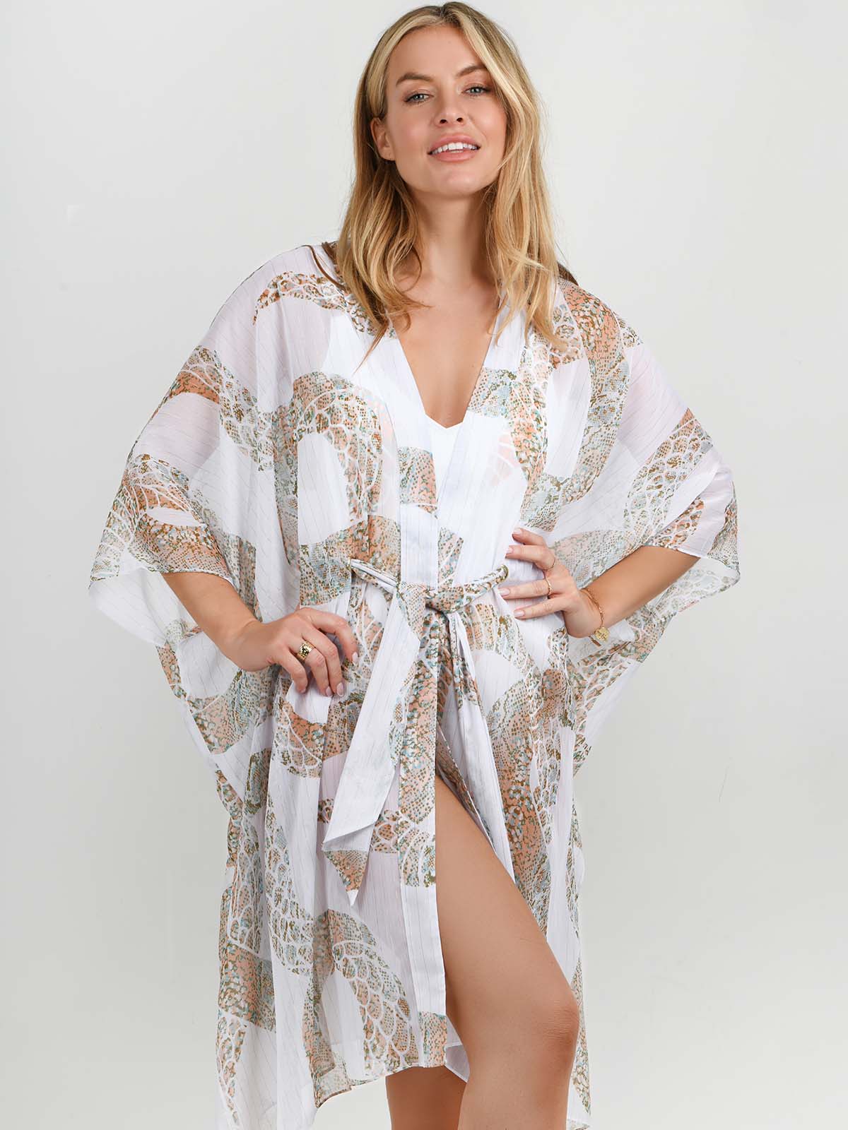 Ibiza Snake swimsuit and kaftan from the Golden Hour Collection SS26 NAIA Beach