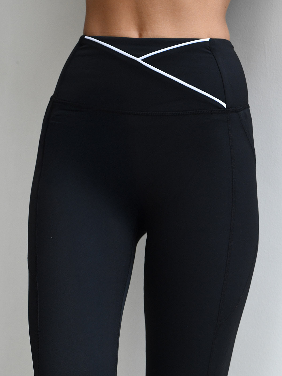 Billie legging in black with white piping detAil from NAIA Active active wear collection