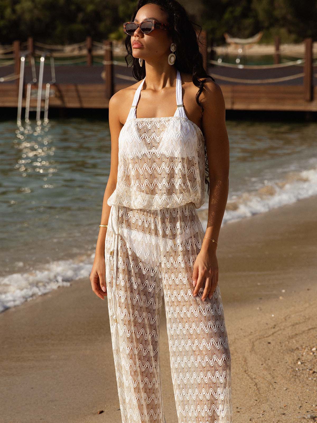 Model wearing the Ibiza jumpsuit by NAIA Beach 